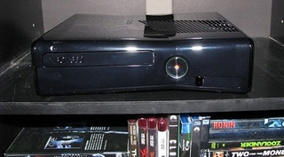 Illustration for article titled New Xbox 360 Warns You Of Possible Doom